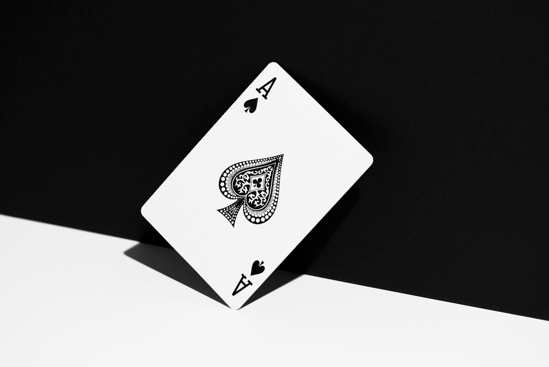 Ace of Spades playing card standing against a black and white background. Perfect for gambling and gaming themes. — Benefits