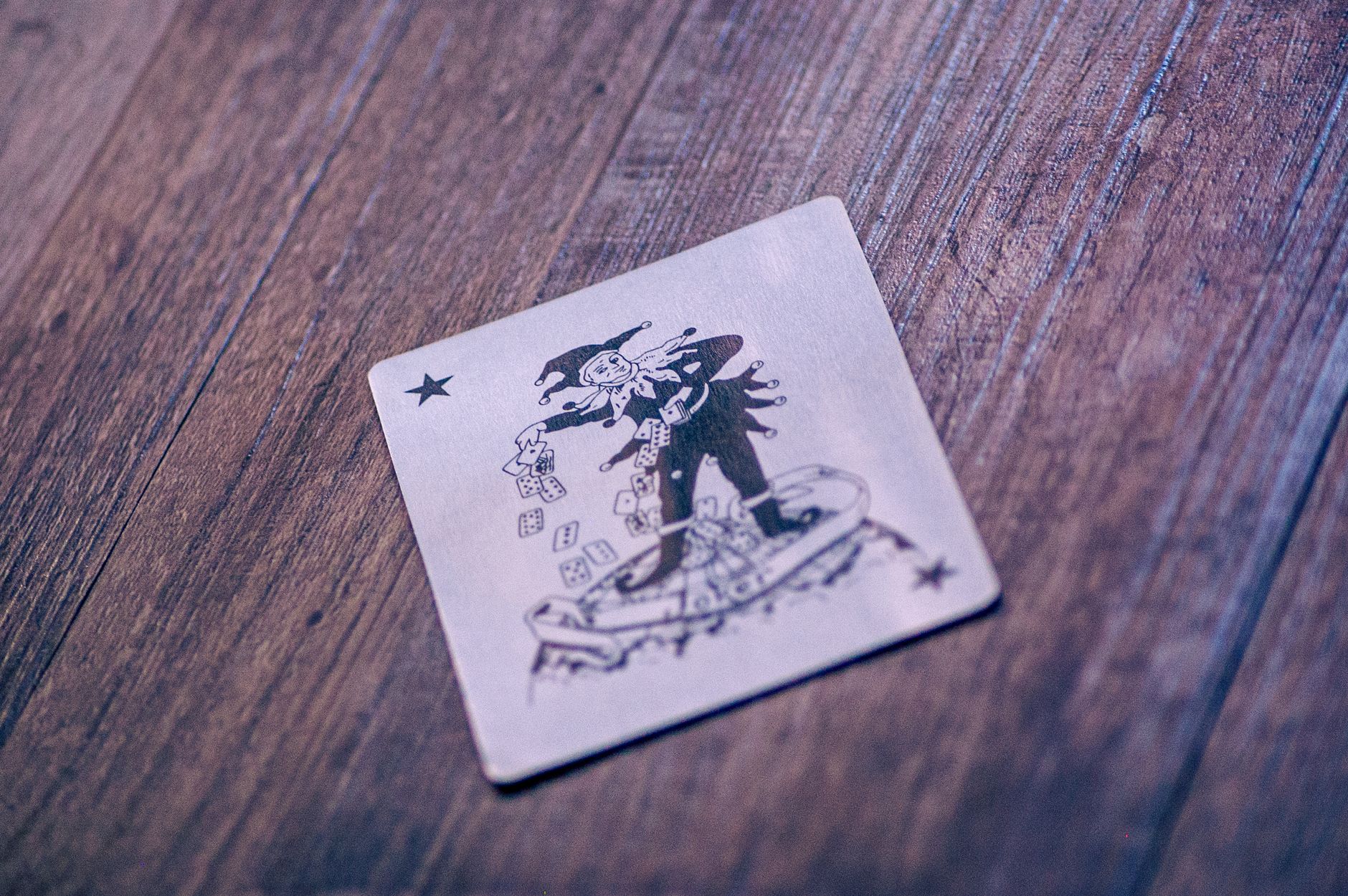 A Joker playing card lies on a textured wooden surface, creating a classic gaming vibe. — So Why Do SomeSlotsNeverAppear topa