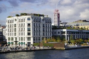 Scenic view of historical buildings on Istanbul's waterfront, bustling with activity. — Taking Advantage of Odds Boos