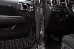 Detailed interior shot of a car showing the door panel and part of the dashboard. — Sweet Dreams: The Benefits of CBD Gummies