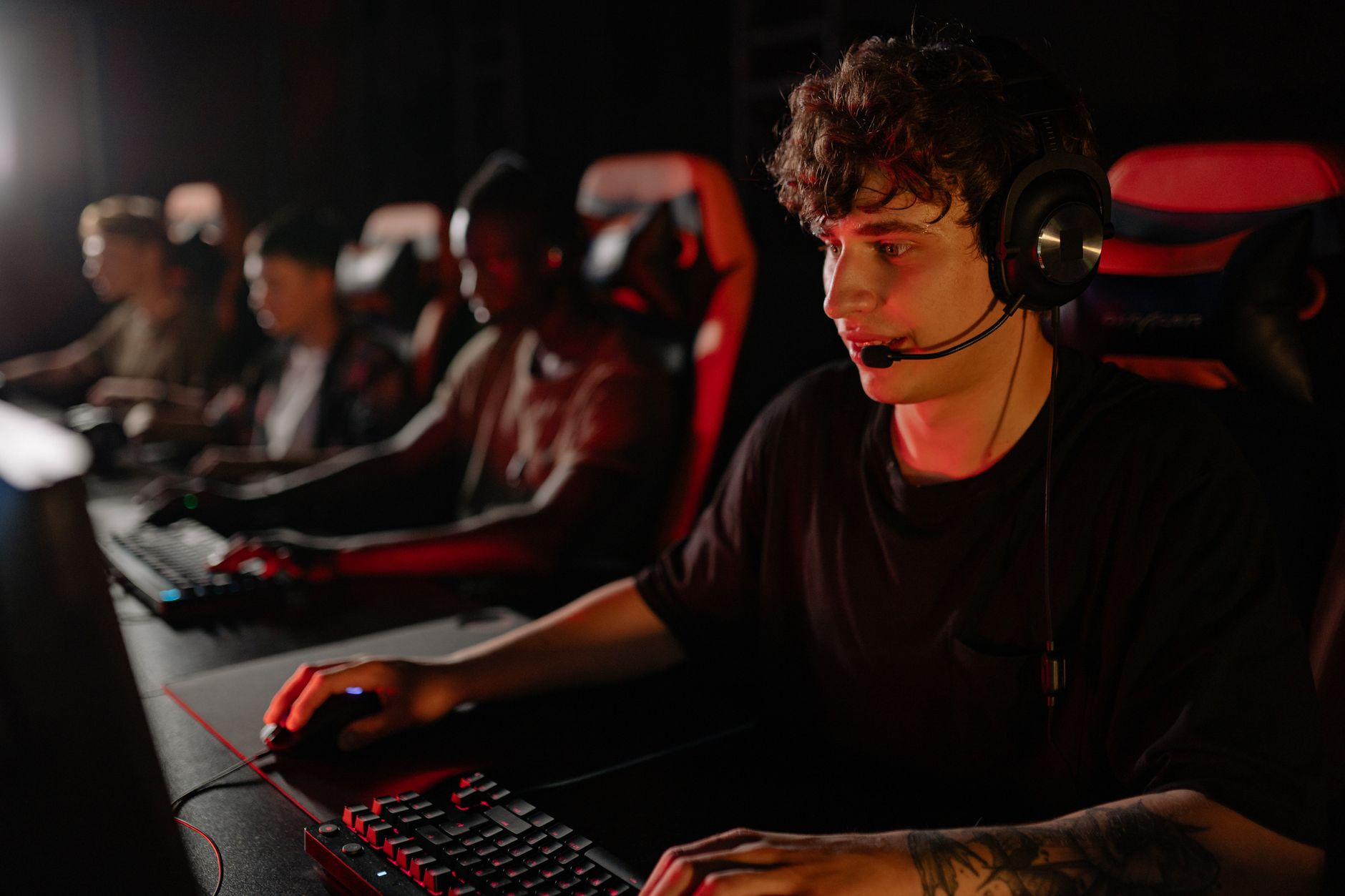 A dedicated team of young gamers engaging in a competitive esports tournament. — The Growth of Digital Sports Betting and Cas
